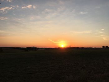 Scenic view of landscape at sunset