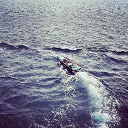 Boat sailing in sea