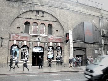 View of people walking in city