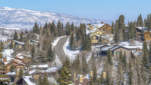 Buildings against sky during winter