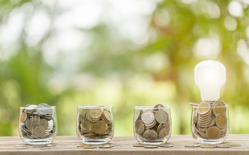 Close-up of coins on table