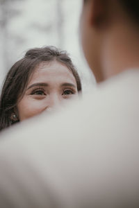 Close-up portrait of a young woman