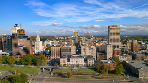 Buildings in city against sky