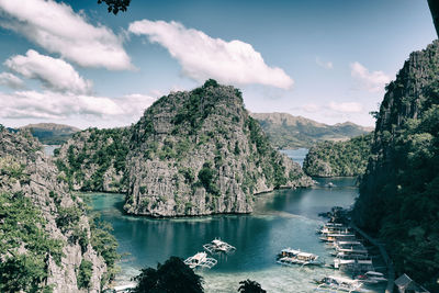 Scenic view of bay against sky