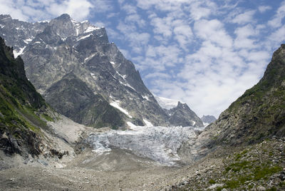 Scenic view of mountains against sky during winter