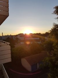 High angle view of townscape against sky during sunset