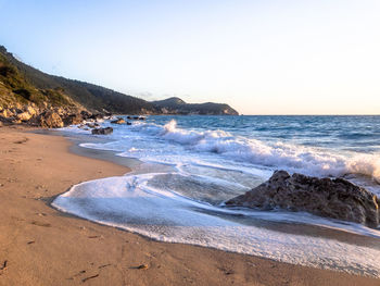 Scenic view of sea against clear sky