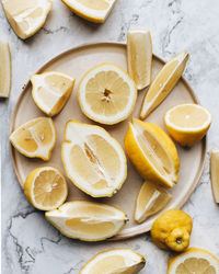 Sliced lemons on a plate flat lay