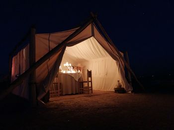 View of tent against clear sky at night