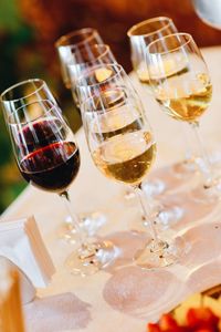 Close-up of wineglasses on table