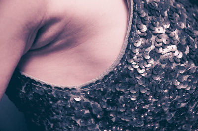 Close-up of woman wearing sequin dress