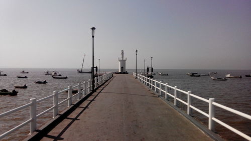 Long jetty leading to calm sea