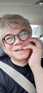 Close-up portrait of smiling mid adult man