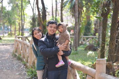 Portrait of happy family at park