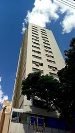 Low angle view of skyscraper against sky