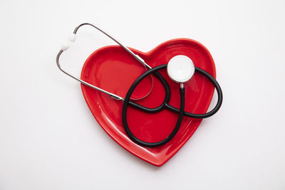 Close-up of stethoscope against white background