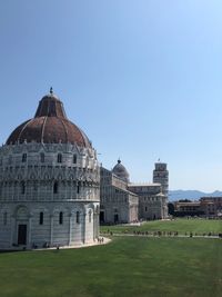 View of temple against clear blue sky