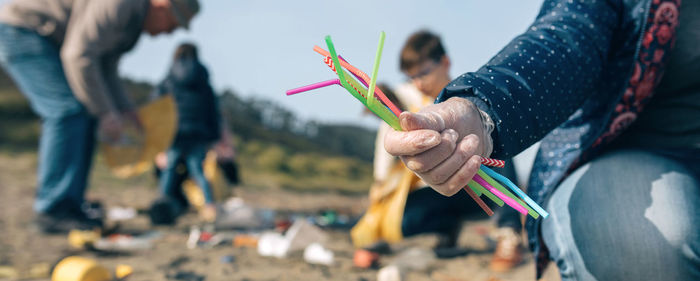 Family cleaning beach