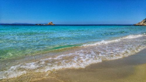 Scenic view of sea against clear sky