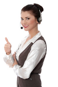 Portrait of a smiling young woman over white background