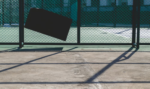 Chainlink fence in basketball court