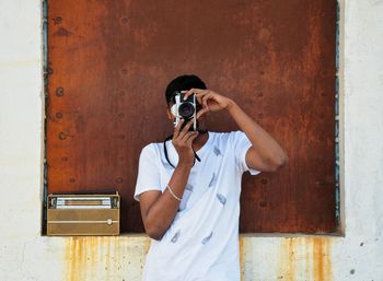 Man photographing with camera