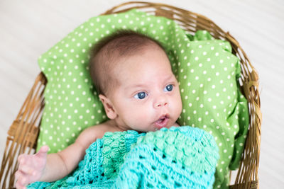 Close-up of cute boy in basket