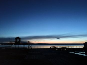 Scenic view of beach against sky during sunset