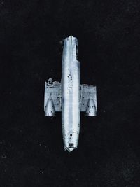 High angle view of airplane on sea against clear sky