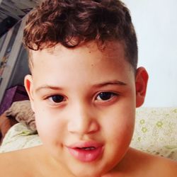 Close-up portrait of smiling boy