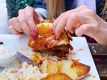 Close-up of woman eating food