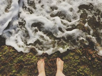 Low section of person in water