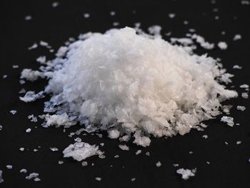 Close-up of crushed ice against black background