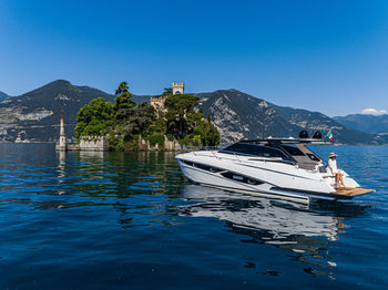 Scenic view of sea against clear blue sky