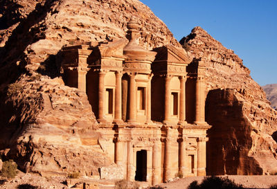 Ruins of temple against mountain