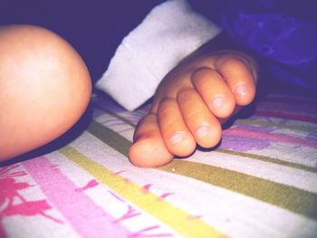 Low section of baby feet