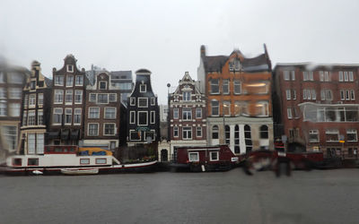 Buildings against sky in city