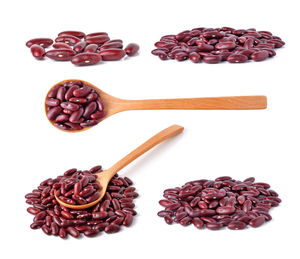 High angle view of coffee beans against white background