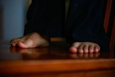 Close-up of man working on table