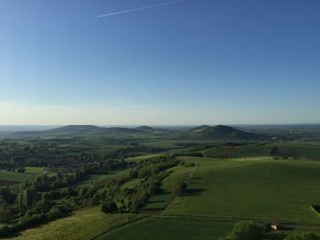 Scenic view of landscape against cloudy sky