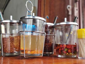 Close-up of drink in glass jar on table