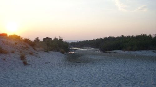 Scenic view of landscape at sunset