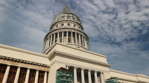 Low angle view of cathedral against cloudy sky