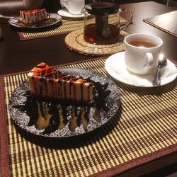 High angle view of coffee served on table