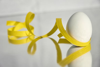 Close-up of yellow flowers on table