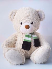 Close-up of stuffed toy against white background