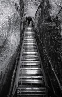 High angle view of man on staircase