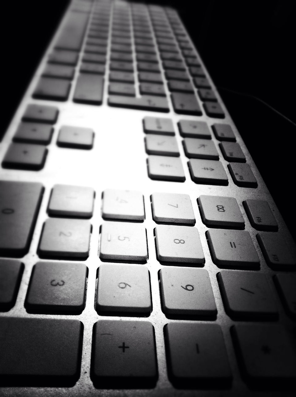 indoors, close-up, technology, communication, computer keyboard, full frame, connection, backgrounds, high angle view, wireless technology, number, repetition, no people, in a row, computer, part of, computer key, laptop, control, selective focus