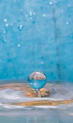 Close-up of water splashing in swimming pool