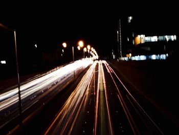 Light trails on road at night